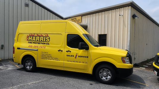 Outside view of the Guardian Fire Systems office and company van