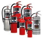 Fire extinguishers of different types and sizes